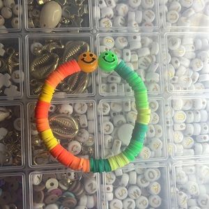 This is a smiley face clay bead bracelet